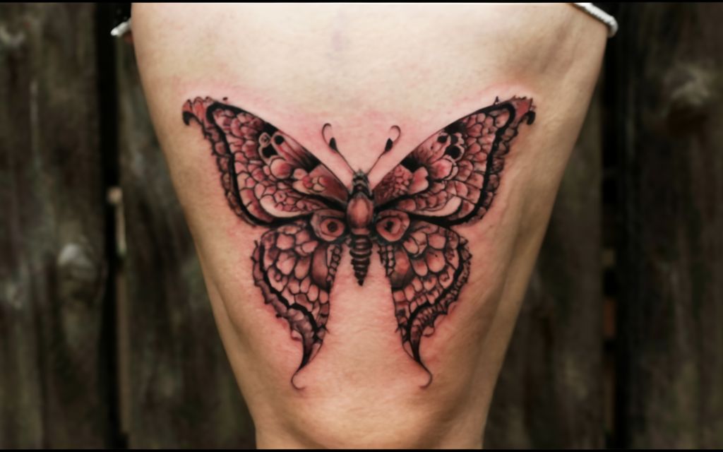 red butterfly tattoo cover