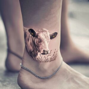 Cow tattoo small - cow tattoos for females - cow tattoo designs - cow tattoo meaning - Cow tattoos for guys - cow tattoo simple