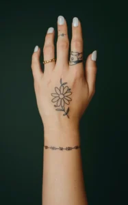 Flower cover up tattoo on arm - Flower cover up tattoo small - Flower cover up tattoo female -Rose flower cover up tattoo - Best flowers for cover up tattoos - Flower cover up tattoo on Shoulder - Flower cover up tattoo lower back - Lotus flower cover up tattoo